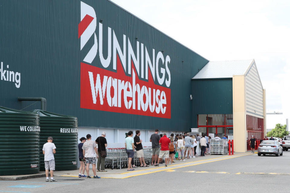 Shoppers are forced to queue outside Bunnings in Myaree due to new government social distancing measures in Perth, Australia.