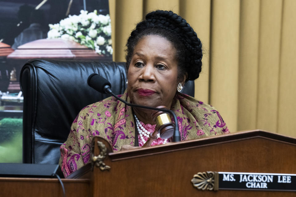 Rep. Sheila Jackson Lee at the microphone.