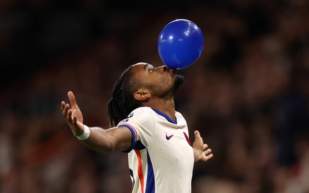 Christopher Nkunku finds a new way of celebrating after scoring for Chelsea.