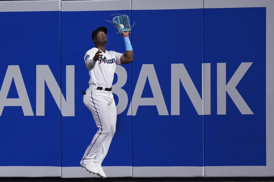 Miami Marlins right fielder Jesus Sanchez catches a ball hit by Oakland Athletics' JJ Bleday during the third inning of a baseball game, Sunday, June 4, 2023, in Miami. (AP Photo/Wilfredo Lee)