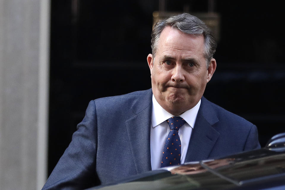 Britain's Secretary of State for International Trade Liam Fox leaves 10 Downing Street in London after a cabinet meeting, Tuesday, April 2, 2019. Political chaos continued to reign as the Cabinet held a marathon session to try to find a way out of the crisis. A group of pro-Brexit ministers pressed British Prime Minister Theresa May to go forward with a no-deal departure. Other Cabinet members and a majority of lawmakers think that would be a disaster. (AP Photo/Kirsty Wigglesworth)