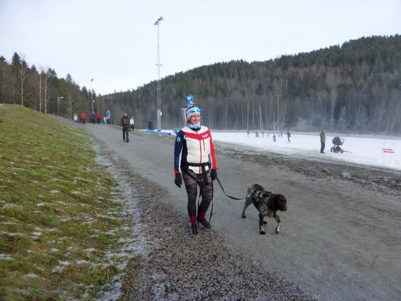 Weekend walker Marie Sten walks with a dog in Oslo