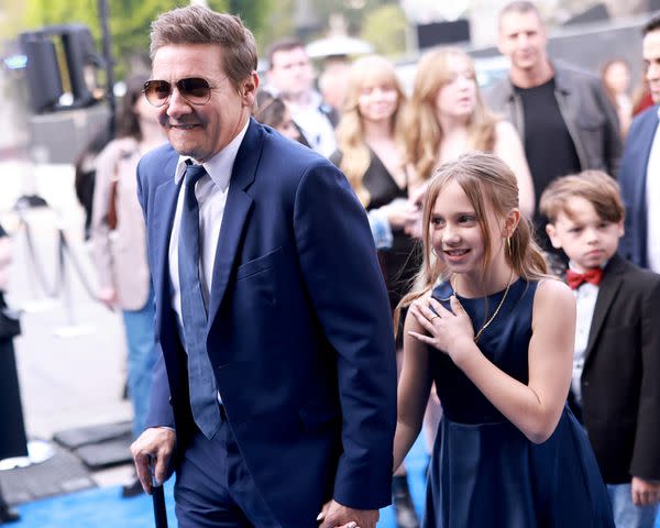 <p>Matt Winkelmeyer/GA/The Hollywood Reporter via Getty </p> Jeremy Rener and daughter Ava attend the Los Angeles premiere of 'Rennervations'