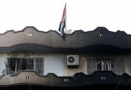 <p>Damaged building of the Iraqi embassy is seen after an attack in Kabul, Afghanistan July 31, 2017. (Mohammad Ismail/Reuters) </p>