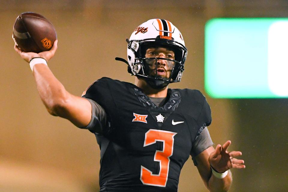 Oklahoma State quarterback Spencer Sanders throws a pass during the second half of the team's NCAA college football game against Arizona State on Saturday, Sept. 10, 2022, in Stillwater, Okla. (AP Photo/Brody Schmidt)