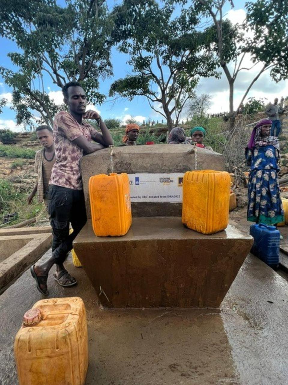 Villagers collect water from one of International Rescue Committee’s sustainable water projects in Ethiopia (IRC)