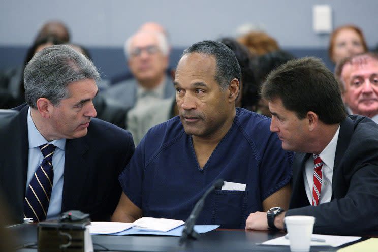 O.J. Simpson appears in court with attorneys Gabriel Grasso (L) and Yale Galanter prior to sentencing in 2008. (Getty)