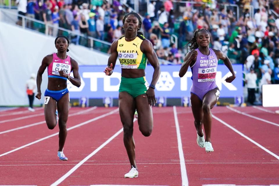 Shericka Jackson, centre, clocked 21.45 seconds en route to winning the 200m at the World Championships on Thursday (Martin Rickett/PA) (PA Wire)