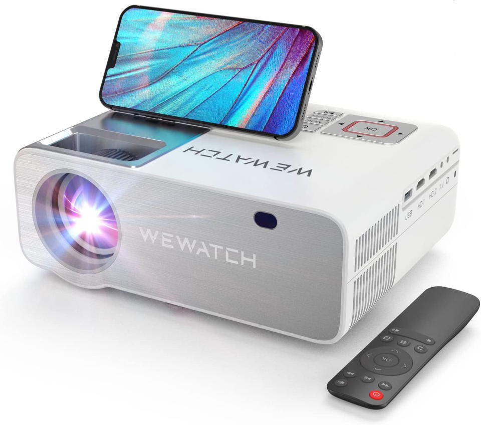 <p><a href="https://go.redirectingat.com?id=74968X1596630&url=https%3A%2F%2Fwww.walmart.com%2Fip%2FWEWATCH-WiFi6-Projector-4K-Supported-350ANSI-15000-Lumen-6D-4-Point-50-Keystone-Correction-Native-1080P-Portable-Bluetooth-Outdoor-Movies-Compatible-%2F449402348&sref=https%3A%2F%2Fwww.housebeautiful.com%2Fshopping%2Fhome-gadgets%2Fg44357784%2Fbest-outdoor-projectors%2F" rel="nofollow noopener" target="_blank" data-ylk="slk:Shop Now;elm:context_link;itc:0;sec:content-canvas" class="link ">Shop Now</a></p><p>WiFi6 Projector</p><p>$149.99</p><p>walmart.com</p><span class="copyright">Walmart</span>
