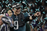 <p>Philadelphia Eagles quarterback Nick Foles (9) holds his daughter, Lily James, after winning the NFL Super Bowl 52 football game against the New England Patriots, Sunday, Feb. 4, 2018, in Minneapolis. The Eagles won 41-33. (AP Photo/Frank Franklin II) </p>