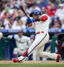 Philadelphia Phillies' Jean Segura cracks his bat on an RBI single during the fourth inning of a baseball game against the New York Yankees, Saturday, June 12, 2021, in Philadelphia. (AP Photo/Laurence Kesterson)