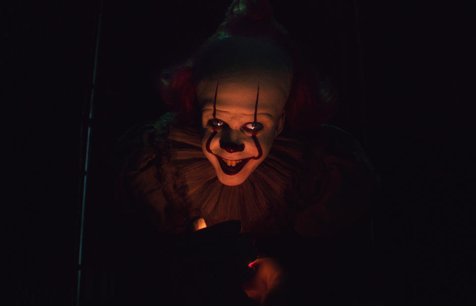 This image released by Warner Bros. Pictures shows Bill Skarsgard as Pennywise in New Line Cinema’s horror thriller "It: Chapter 2," in theaters on Sept. 6. (Warner Bros. Pictures via AP)