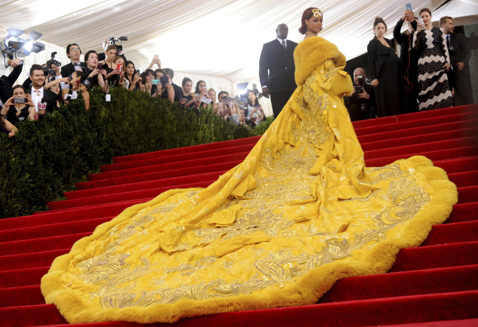 FILE - This May 4, 2015 file photo shows singer Rihanna at The Metropolitan Museum of Art's Costume Institute benefit gala celebrating "China: Through the Looking Glass" in New York. (Photo by Charles Sykes/Invision/AP)