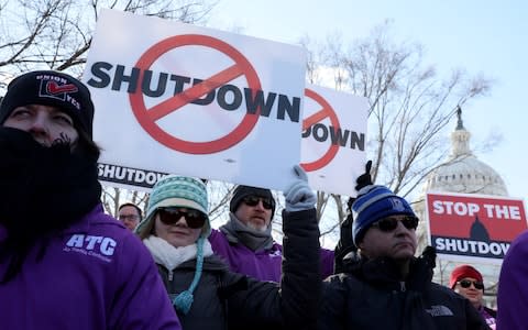Federal air traffic controller union members protest the partial U.S. federal government shutdown in a rally at the US Capitol in Washington DC - Credit: Jonathan Ernst&nbsp;/REUTERS