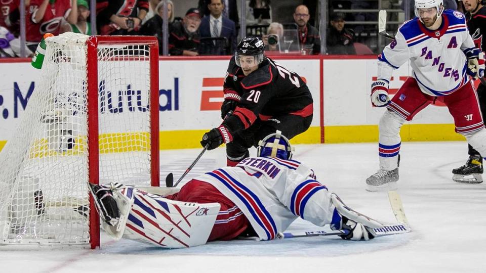Carolina Hurricanesí Sebastian Aho (20) scores on New York Rangersí goalie Igor Shesterkin (31) in the third period to tie the score 1-1 and force overtime on Wednesday, May 18, 2022 during game one of the Stanley Cup second round at PNC Arena in Raleigh, N.C.