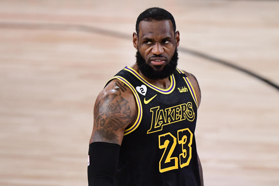 LAKE BUENA VISTA, FLORIDA - OCTOBER 02: LeBron James #23 of the Los Angeles Lakers reacts during the first half against the Miami Heat in Game Two of the 2020 NBA Finals at AdventHealth Arena at ESPN Wide World Of Sports Complex on October 02, 2020 in Lake Buena Vista, Florida. NOTE TO USER: User expressly acknowledges and agrees that, by downloading and or using this photograph, User is consenting to the terms and conditions of the Getty Images License Agreement. (Photo by Douglas P. DeFelice/Getty Images)