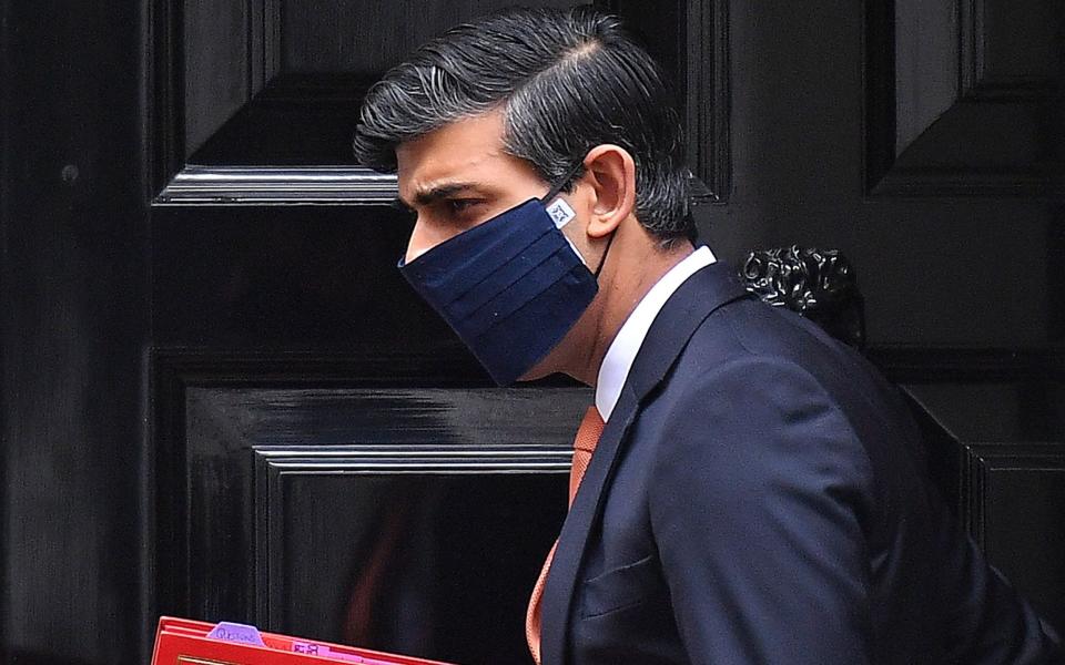 Rishi Sunak's temporary abolition of VAT on disposable face coverings will expire at the end of October - Justin Tallis/AFP