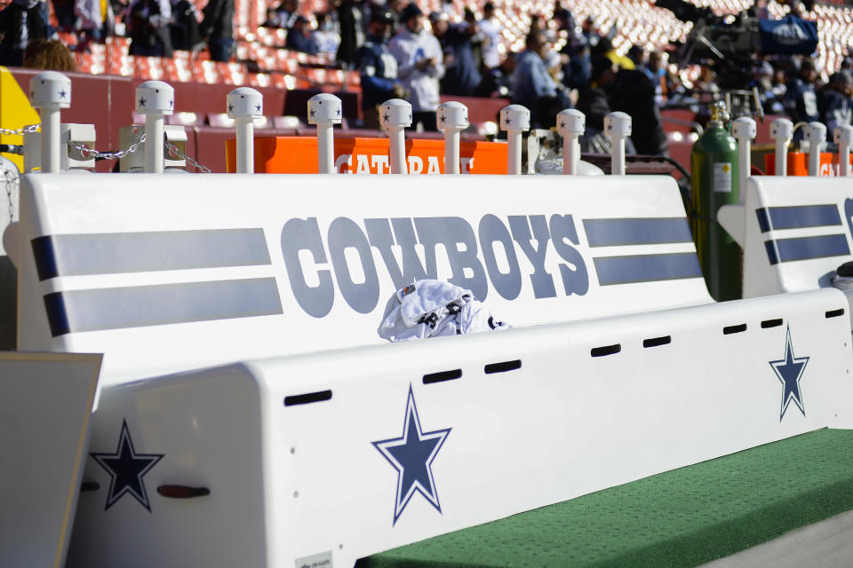 Dallas Cowboys' benches are seen on the sideline prior to the start of the first half of an NFL football game against the Washington Football Team, Sunday, Dec. 12, 2021, in Landover, Md. (AP Photo/Mark Tenally)