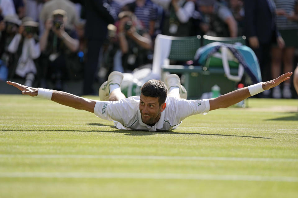 FILE - Serbia's Novak Djokovic celebrates after beating Australia's Nick Kyrgios to win the final of the men's singles on day fourteen of the Wimbledon tennis championships in London, Sunday, July 10, 2022. Speaking about his own hopes and dreams as a 7-year-old kid, Djokovic noted two primary goals: reaching No. 1 in the world and winning Wimbledon. (AP Photo/Alastair Grant, File)