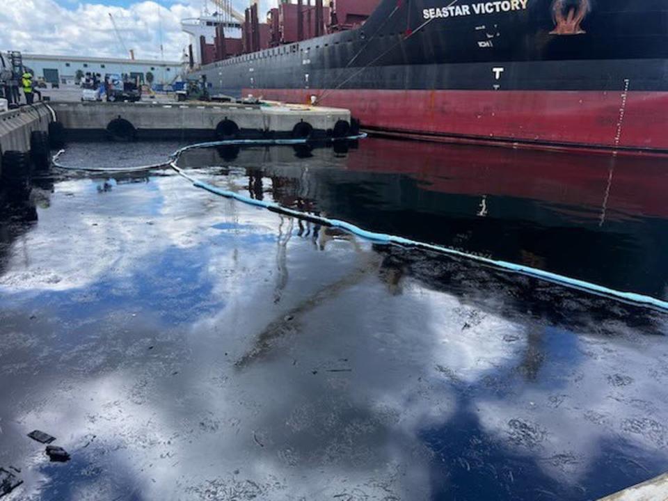 Clean up crews have removed over 14,000 gallons of contaminated water from Port Manatee after a crude oil spill was reported Friday, the U.S. Coast Guard said.