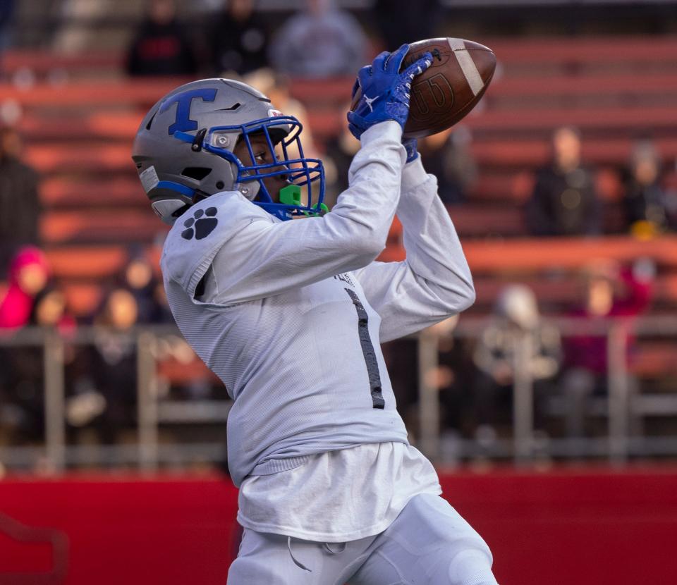 Passaic Tech Cashmere Jones pulls in a long pass but Tech was unable to capitalize on it, Toms River North Football vs Passaic Tech in NJSIAA Group 5 Final in Piscataway, NJ on December 4, 2022. 