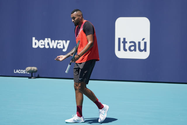 Nick Kyrgios of Australia reacts after losing a point to Jannik Sinner of Italy, during the Miami Open tennis tournament, Tuesday, March 29, 2022, in Miami Gardens, Fla. (AP Photo/Wilfredo Lee)