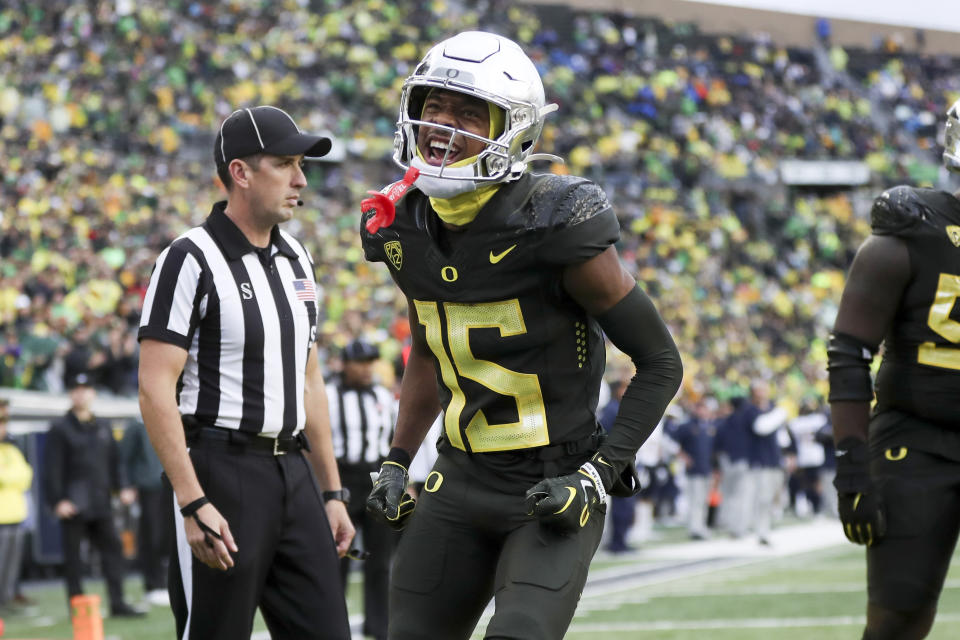 Oregon wide receiver Tez Johnson celebrates after scoring a touchdown against California during the first half of an NCAA football game, Saturday, Nov. 4, 2023, in Eugene, Ore. (AP Photo/Amanda Loman)