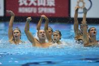 The United Staes team, including Bill May, front left, compete in the team acrobatic of artistic swimming at the World Swimming Championships in Fukuoka, Japan, Saturday, July 15, 2023. Largely unnoticed by the general public, men have been participating in artistic swimming, formerly known as synchronized swimming, for decades. (AP Photo/Nick Didlick)