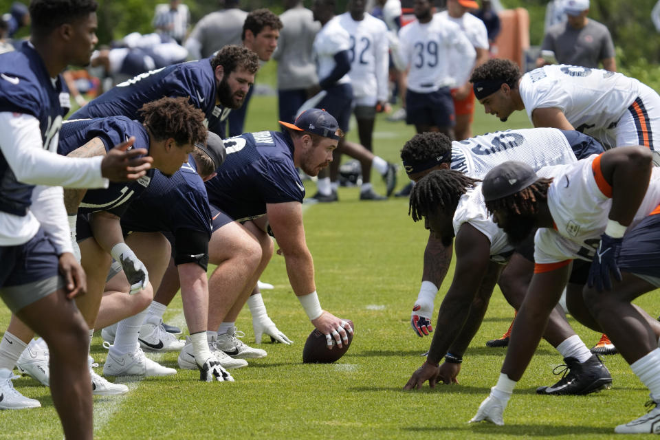 FILE - Chicago Bears players work on the field during NFL football practice at the team's minicamp in Lake Forest, Ill., Wednesday, June 5, 2024. (AP Photo/Nam Y. Huh, File)