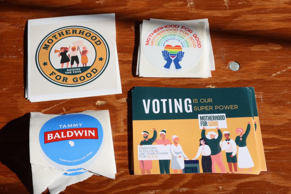 Stickers on the table from Democratic Sen. Tammy Baldwin's campaign event with Lt. Gov. Sara Rodriguez. They met and answered questions from Waukesha-area moms and the organization Motherhood For Good on Sunday, January 14, 2024.