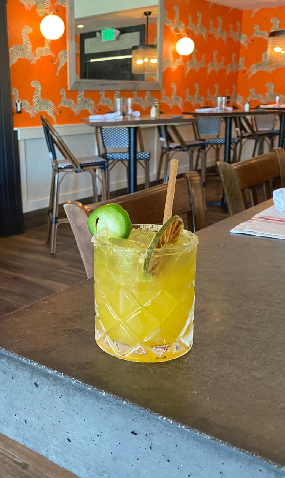 A newfangled summer margarita at Almond features tequila, Chinola Passionfruit Liqueur, lime juice, agave and jalapeno.