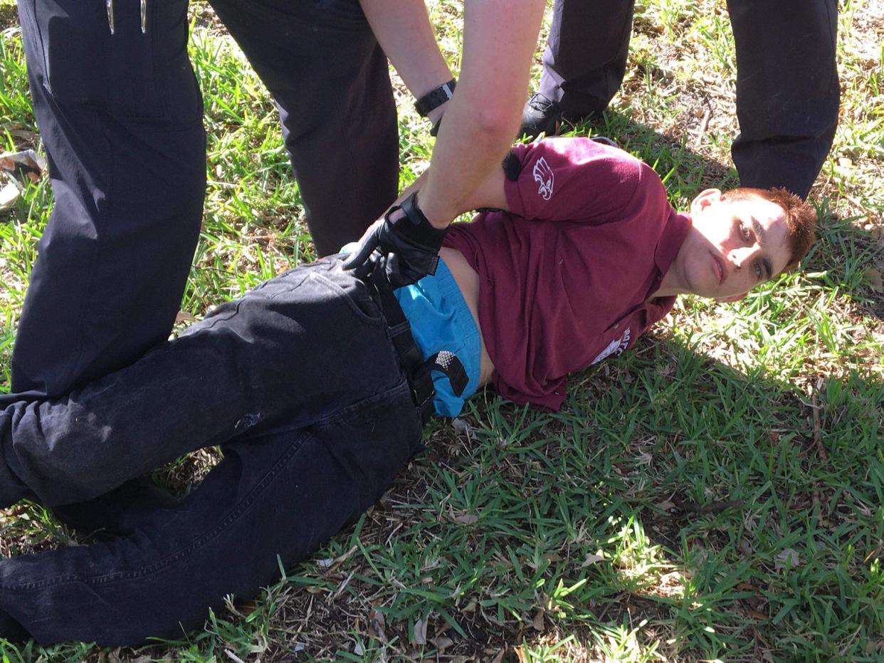 Nikolas Cruz is arrested following the shooting at his former school