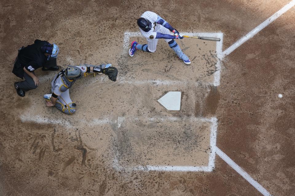 Milwaukee Brewers' William Contreras hits a triple during the fourth inning of a baseball game against the Pittsburgh Pirates Sunday, June 18, 2023, in Milwaukee. (AP Photo/Morry Gash)