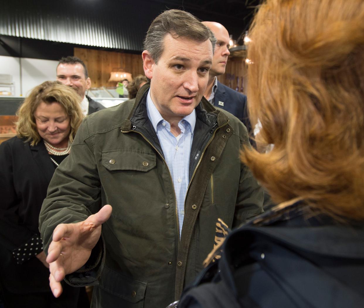 Ted Cruz, candidate for the Republican nomination for U.S. President, talks with Kristine Carlin during a campaign stop at the Wagon Wheel restaurant in Bloomington on May 2, 2016. He suspended his campaign the next day after losing the Indiana primary to Donald Trump. David Snodgress | Herald-Times