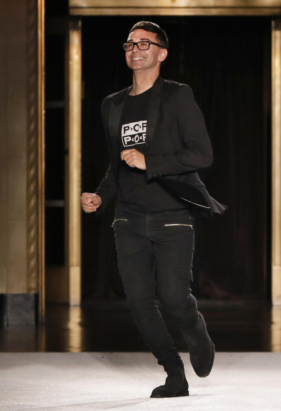 FILE - Designer Christian Siriano appears on the runway after his collection was modeled during Fashion Week on Sept. 7, 2019, in New York. Siriano turns 35 on Nov. 18. (AP Photo/Richard Drew, File)