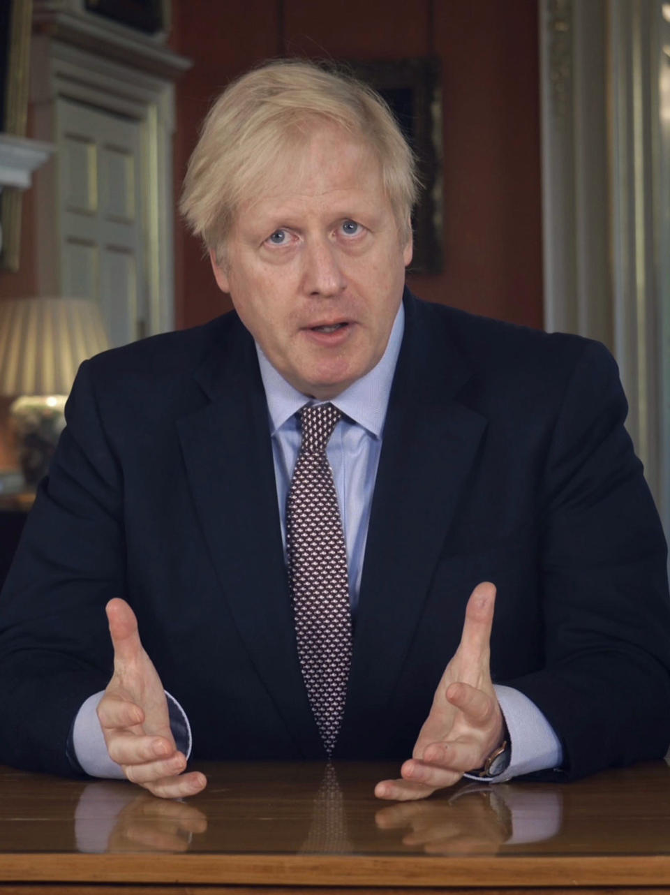 In this grab taken from video issued by Downing Street on Sunday, May 10, 2020, Britain's Prime Minister Boris Johnson delivers an address on lifting the country's lockdown amid the coronavirus pandemic. (Downing Street via AP)