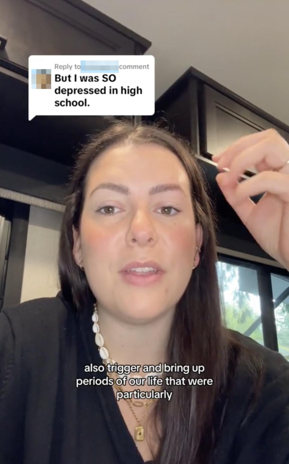 Nikki is speaking in a video with captions about experiencing depression in high school