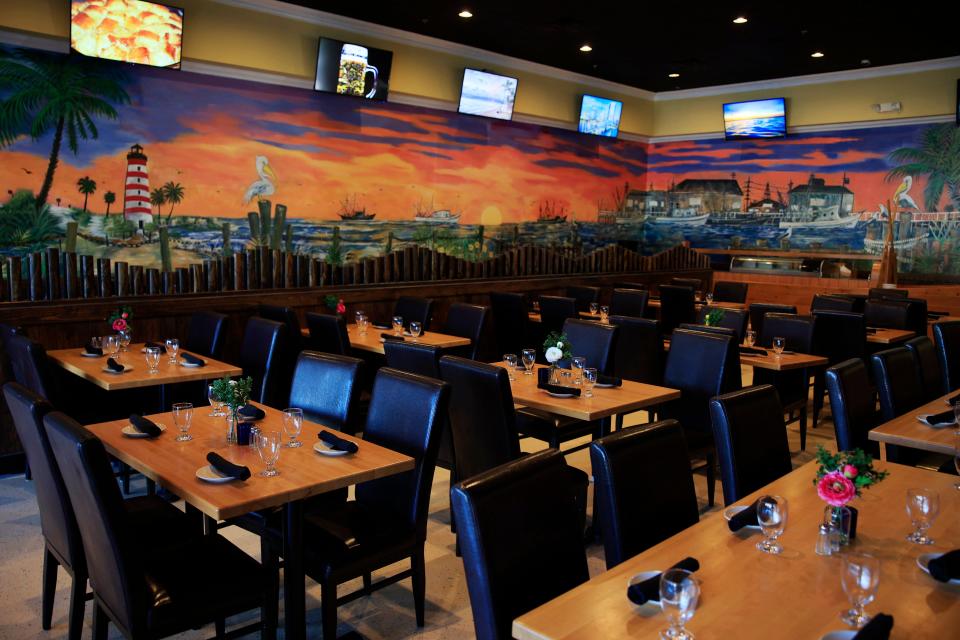 Pictured earlier this year, a dining area at Crabcake Factory Seafood Grille & Bar in Jacksonville Beach.