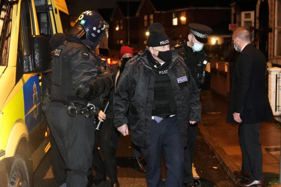 Prime Minister Boris Johnson observes an early morning Merseyside Police raid on a home in Liverpool as part of ‘Operation Toxic’ to infiltrate County Lines drug dealings, ahead of the publication of the government’s 10-year drug strategy (Christopher Furlong/PA) (PA Wire)