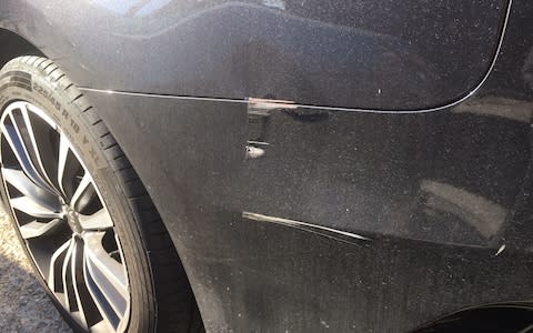 kia stinger long-term - damage to rear 3/4 caused by some appalling parking