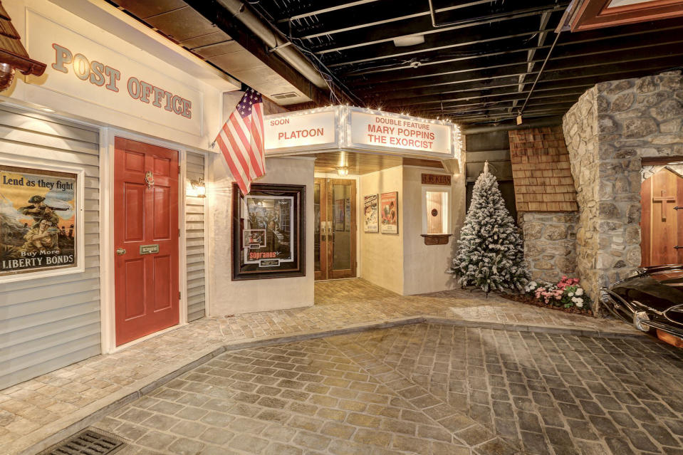 Storefront facades feature realistic advertisements and elaborate details.  (Home Visit)