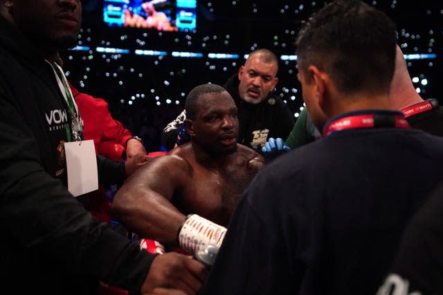 Whyte, centre, slipped to his third defeat in 31 fights (Nick Potts/PA)