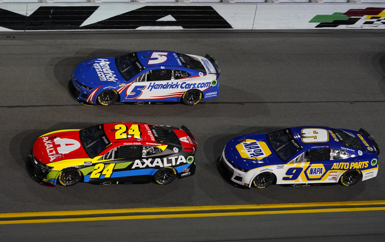 Feb 17, 2022; Daytona, FL, USA; NASCAR Cup Series driver Kyle Larson (5), driver Chase Elliott (9) and driver William Byron (24) during the Bluegreen Vacations Duel 1 at Daytona International Speedway. Mandatory Credit: Mike Dinovo-USA TODAY Sports