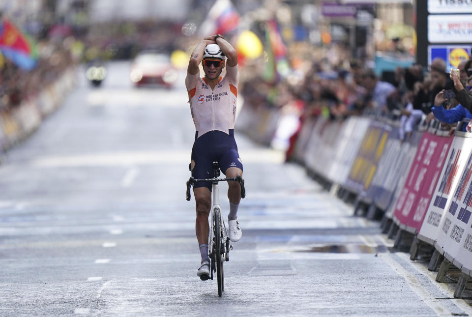 Netherlands' Mathieu van der Poel celebrates after winning on day four of the 2023 UCI Cycling World Championships in Glasgow, Scotland, Sunday Aug. 6, 2023. (Tim Goode/PA via AP)