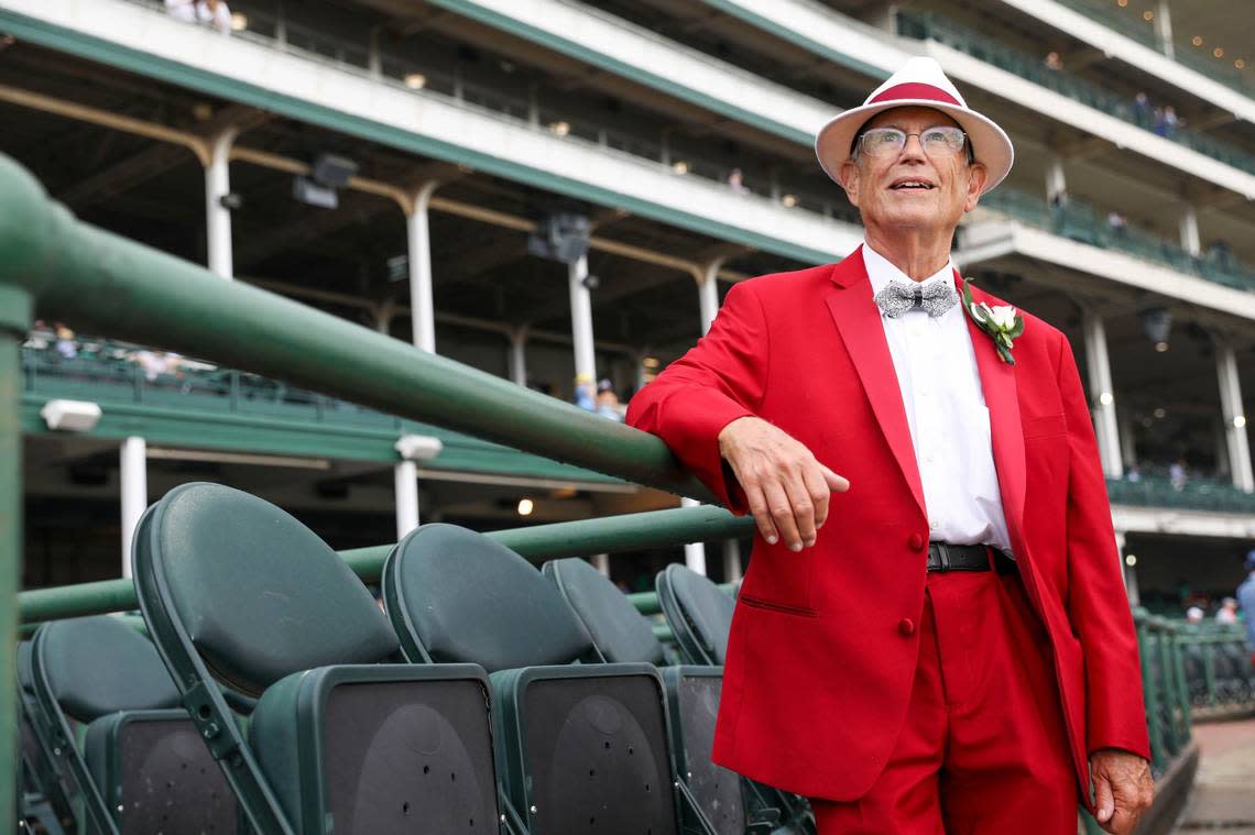 John Allen wears a bright red suit for Kentucky Derby 150 at Churchill Downs in Louisville, Ky., Saturday, May 4, 2024. It’s the same suit he wore to Mardi Gras. Amy Wallot