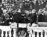 Woodrow Wilson takes the oath of office for his first term of the Presidency on the East Portico at the U.S. Capitol in Washington, D.C., on March 4, 1913. The Chief Justice was Edward D. White. (AP Photo)