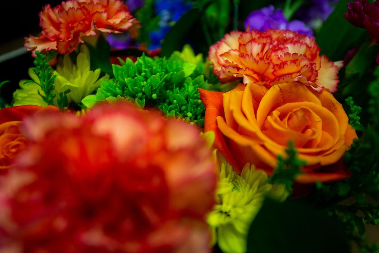 Fresh flowers sit in the cooler of the newly opened Stems Market in Zeeland. 