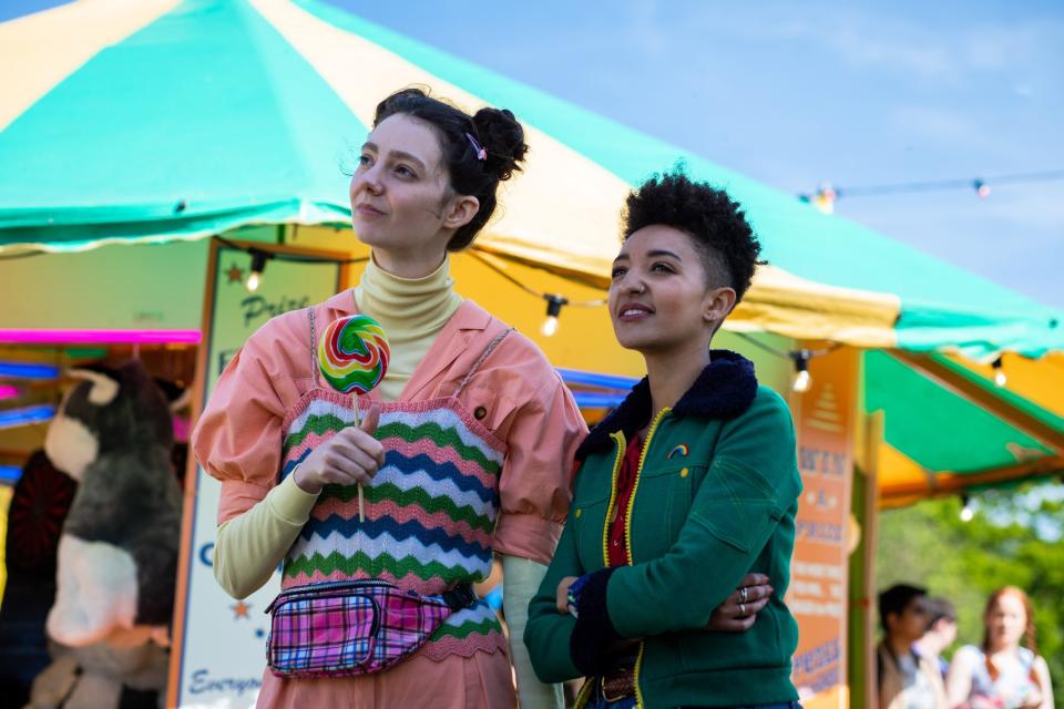 Tanya Reynolds and Patricia Alison stand together at a fair