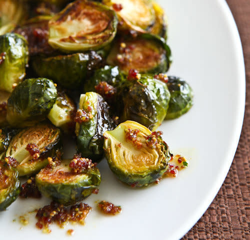 <strong>Get the <a href="http://www.steamykitchen.com/9035-roasted-brussels-sprouts-cranberry-pistachio-pesto.html" target="_blank">Roasted Brussels Sprouts With Cranberry Pistachio Pesto recipe</a> by Steamy Kitchen</strong>
