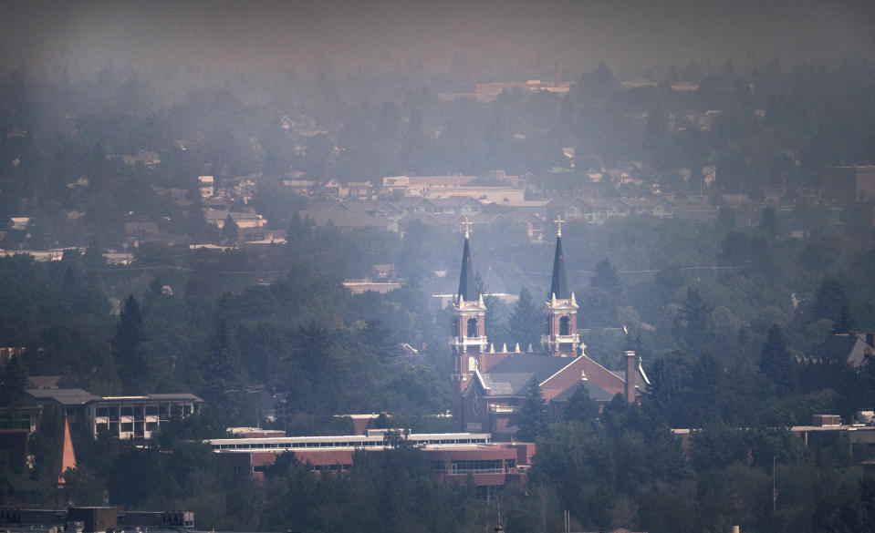 St. Aloysius Church on the campus of Gonzaga University is blanketed in smoke from area wildfires, Saturday, July 10, 2021. (Colin Mulvany/The Spokesman-Review via AP)